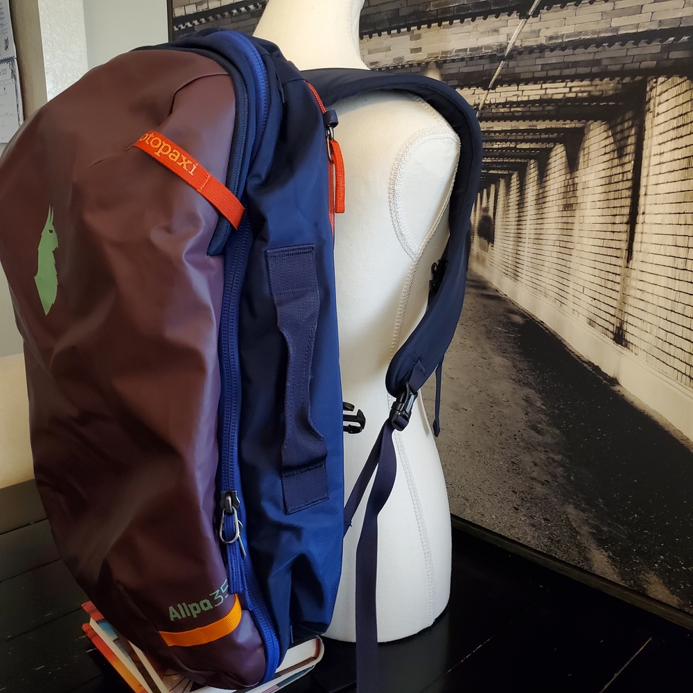 Cotopaxi Plum Purple Backpack with Orange and Green Details 35L